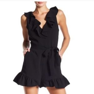 Elizabeth and James Black Ruffle Romper. Size 6